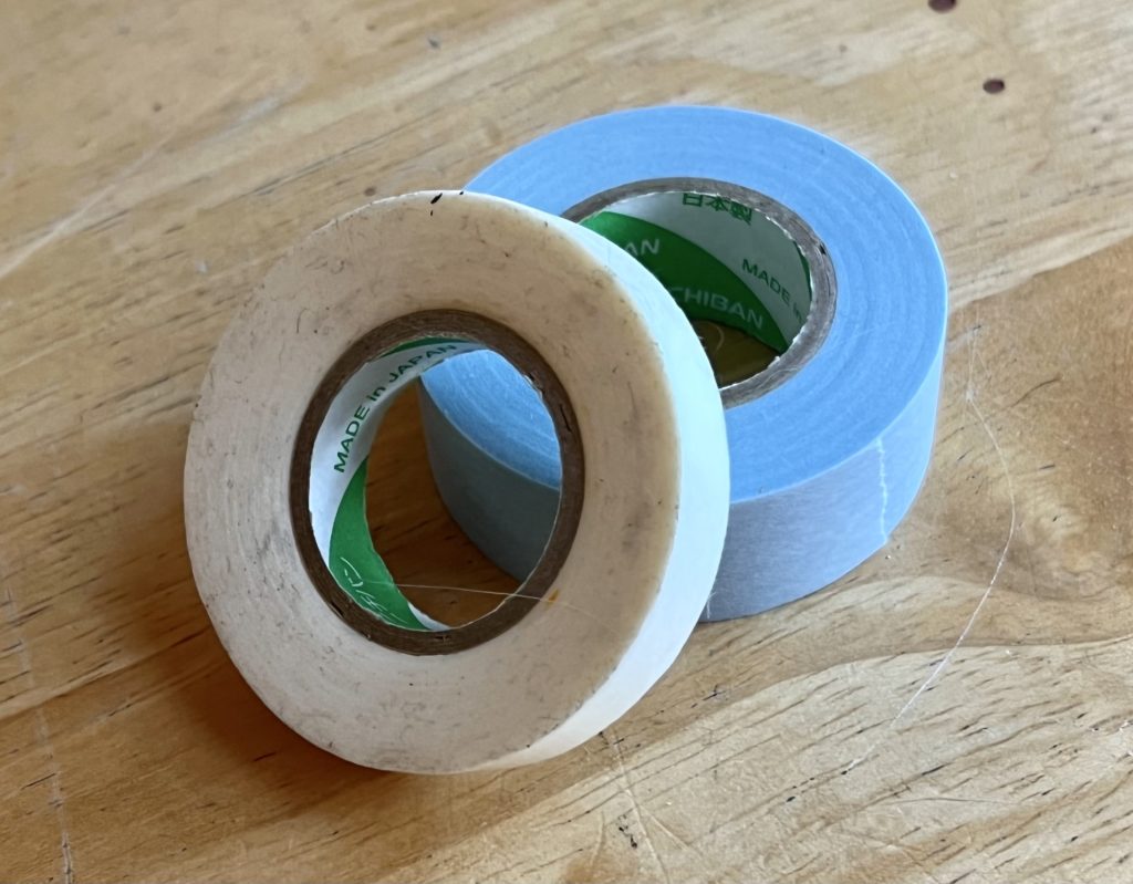 Tape used to prep sketchbook pages before painting sessions.