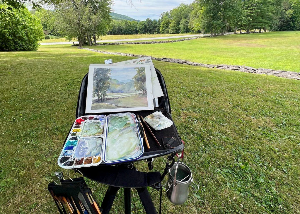 An easel setup outside in front of a view at Chesterwood.